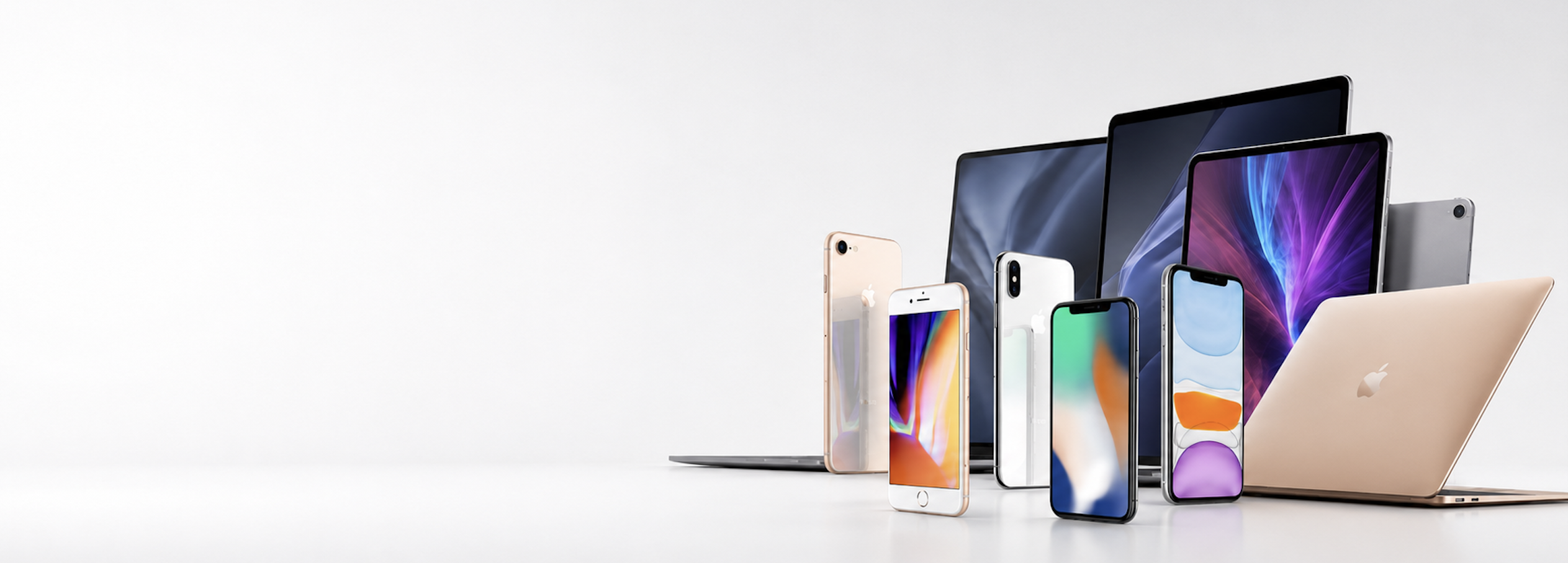 大量に積み上げられたiPhone、Androidスマートフォン、パソコン、タブレット